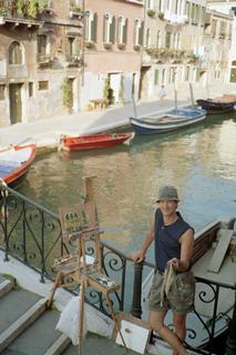 Landscape painting on a bridge in Venice, Italy